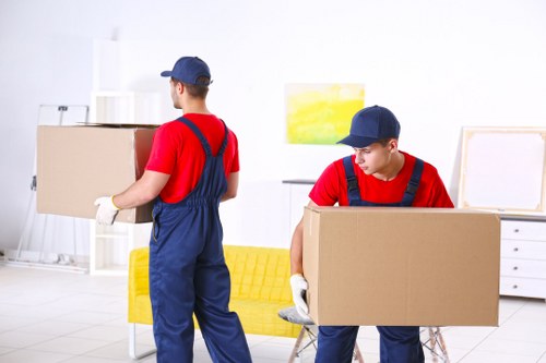 Professional team handling furniture pick-up in Soho Storage