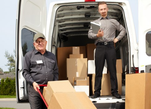 Professional movers handling household items